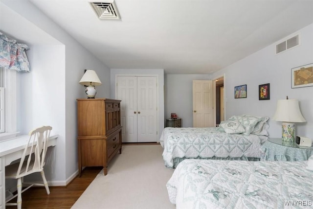 117 Halwill Dr, Amherst, NY 14226 - bedroom with a closet, a desk, and light wood-type flooring