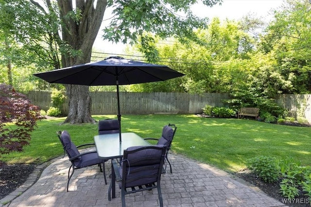 117 Halwill Dr, Amherst, NY 14226 - fenced backyard featuring a patio area and outdoor dining space