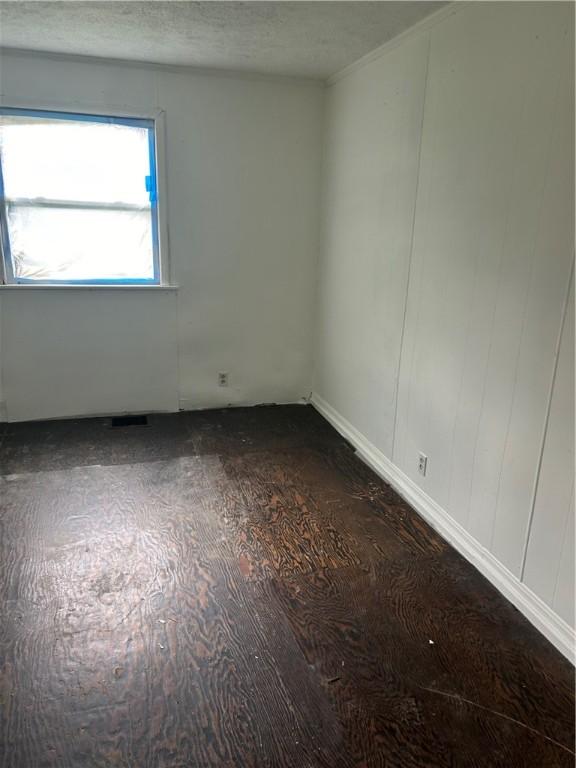 409 Glenwood Ave, Rochester, NY 14613 - unfurnished room featuring a textured ceiling