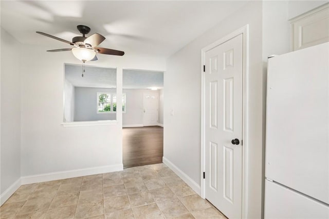 1A Salmon Run, Parma, NY 14468 - spare room with a ceiling fan and baseboards