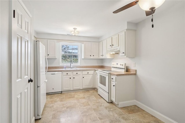 1A Salmon Run, Parma, NY 14468 - kitchen with white appliances, under cabinet range hood, white cabinetry, and ceiling fan