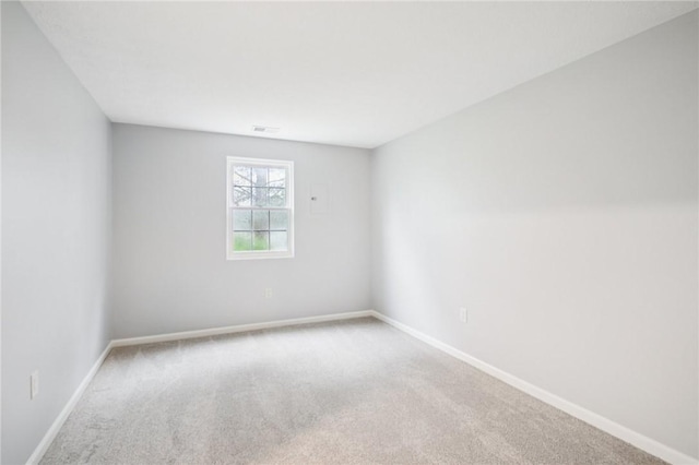 1A Salmon Run, Parma, NY 14468 - empty room with carpet floors and baseboards