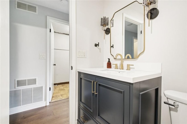 1A Salmon Run, Parma, NY 14468 - bathroom with vanity and wood finished floors