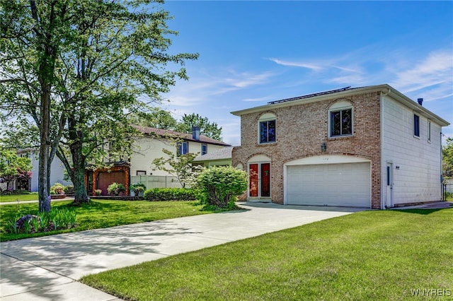 172 Shetland Dr, Amherst, NY 14221 - traditional-style house featuring an attached garage, driveway, and brick siding