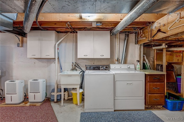 172 Shetland Dr, Amherst, NY 14221 - laundry room with washer and dryer and cabinet space