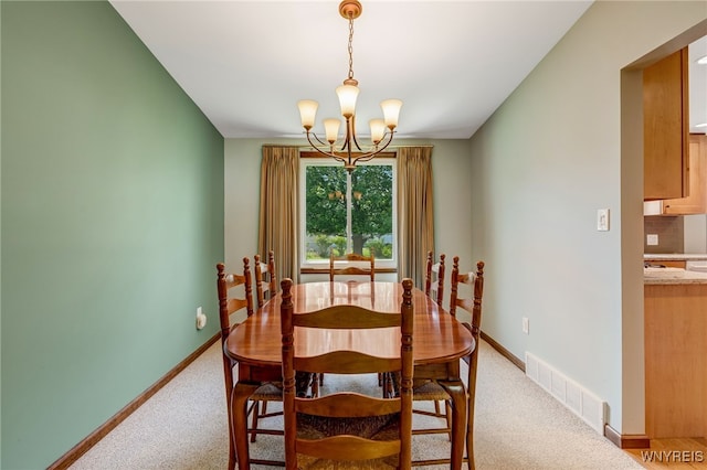172 Shetland Dr, Amherst, NY 14221 - dining space with a chandelier and light colored carpet