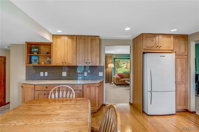 172 Shetland Dr, Amherst, NY 14221 - kitchen featuring freestanding refrigerator, light wood-type flooring, decorative backsplash, open shelves, and recessed lighting