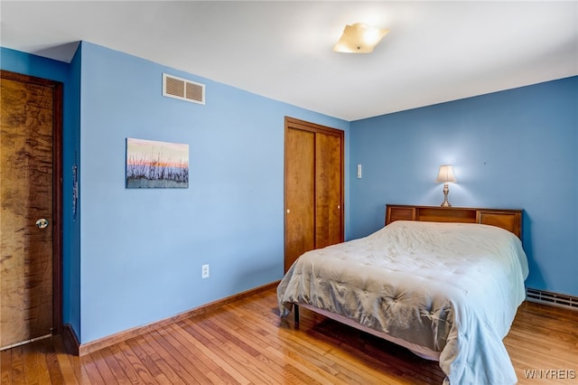172 Shetland Dr, Amherst, NY 14221 - bedroom featuring hardwood / wood-style floors and a closet
