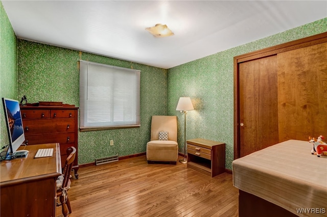 172 Shetland Dr, Amherst, NY 14221 - living area featuring hardwood / wood-style flooring, wallpapered walls, and an office area