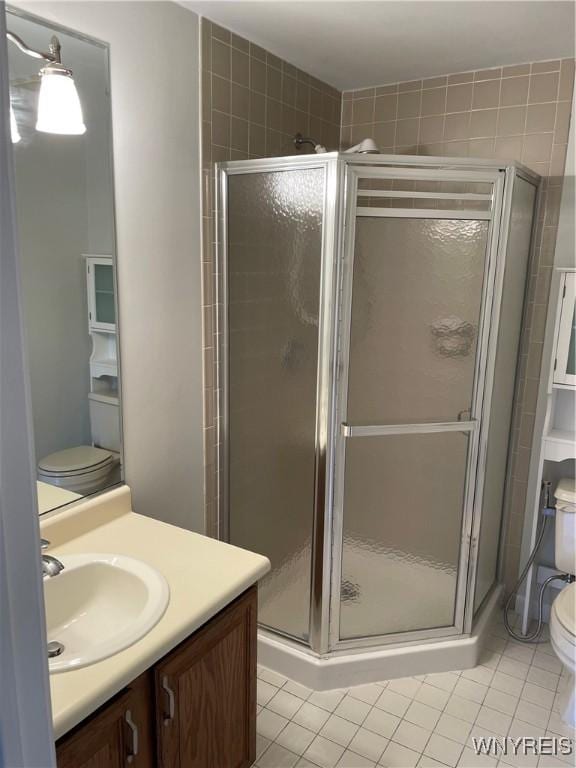 138 Charter Oaks Dr Unit B, Amherst, NY 14228 - full bath featuring vanity, a stall shower, and tile patterned flooring