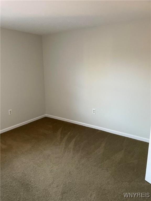 138 Charter Oaks Dr Unit B, Amherst, NY 14228 - unfurnished room with dark carpet and baseboards