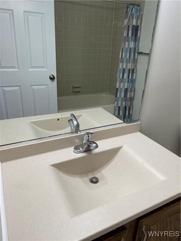138 Charter Oaks Dr Unit B, Amherst, NY 14228 - bathroom featuring vanity and shower / bath combo with shower curtain