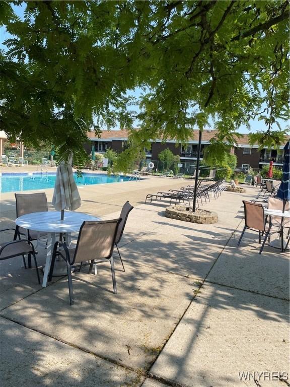138 Charter Oaks Dr Unit B, Amherst, NY 14228 - community pool with a patio