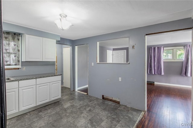 711 Mountainview Ave, Syracuse, NY 13224 - kitchen with white cabinetry