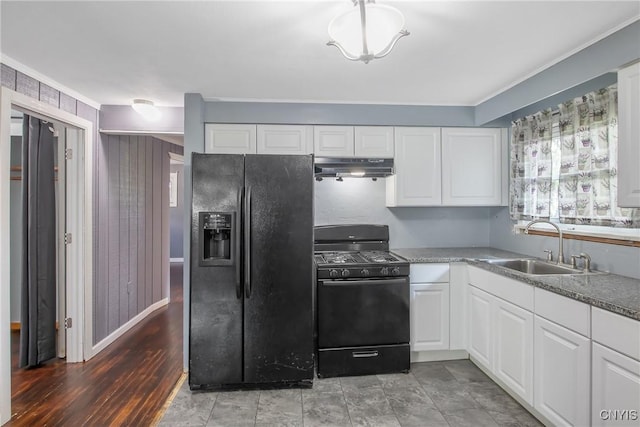 711 Mountainview Ave, Syracuse, NY 13224 - kitchen featuring black appliances, under cabinet range hood, ornamental molding, white cabinetry, and light wood-type flooring