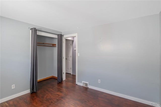 711 Mountainview Ave, Syracuse, NY 13224 - unfurnished bedroom featuring wood finished floors and a closet