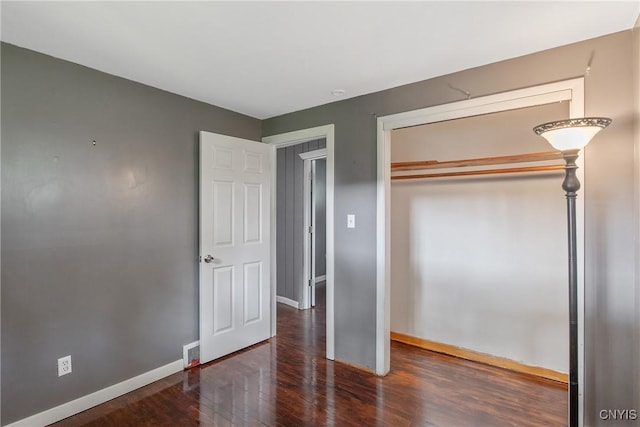 711 Mountainview Ave, Syracuse, NY 13224 - unfurnished bedroom featuring wood finished floors and a closet