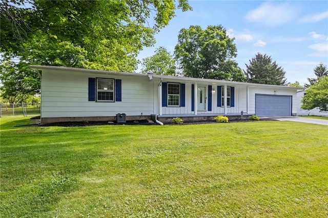 1372 Canandaigua Rd, Macedon, NY 14502 - single story home featuring a garage, driveway, and a porch