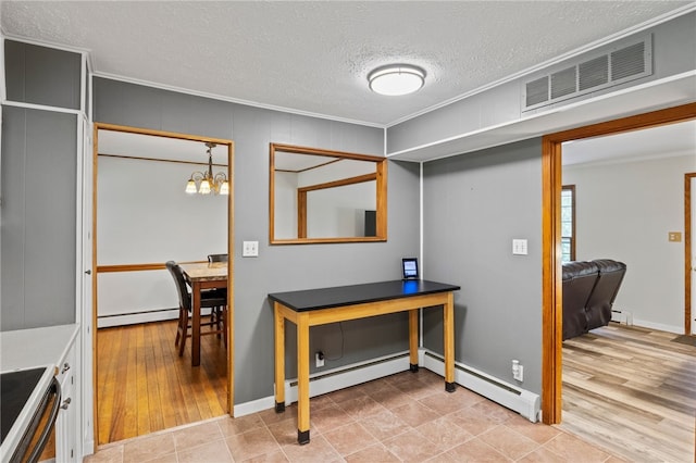 1372 Canandaigua Rd, Macedon, NY 14502 - corridor featuring a textured ceiling, a baseboard radiator, ornamental molding, a baseboard heating unit, and a chandelier