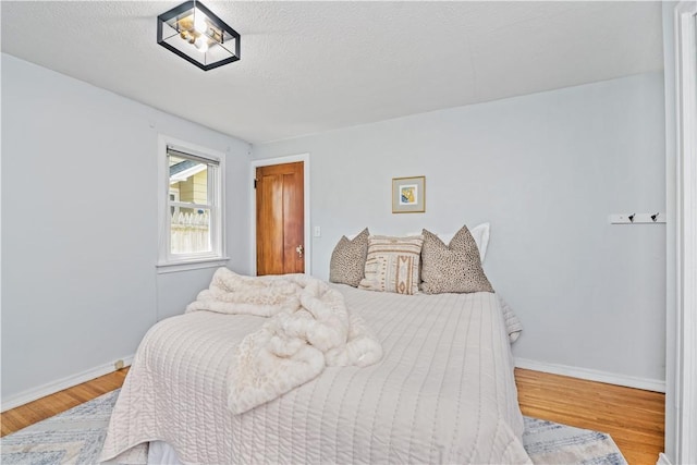 225 Dorking Rd, Brighton, NY 14610 - bedroom featuring wood finished floors