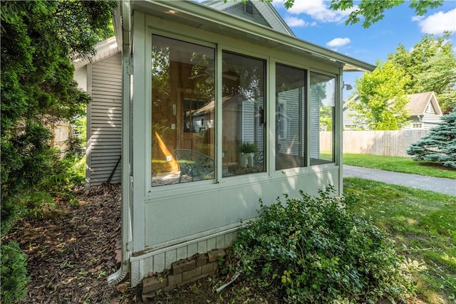 225 Dorking Rd, Brighton, NY 14610 - view of side of home with a sunroom