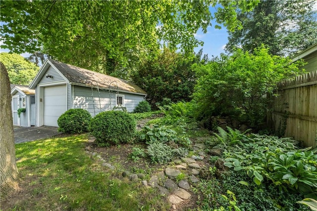 225 Dorking Rd, Brighton, NY 14610 - view of yard with an outbuilding and a garage