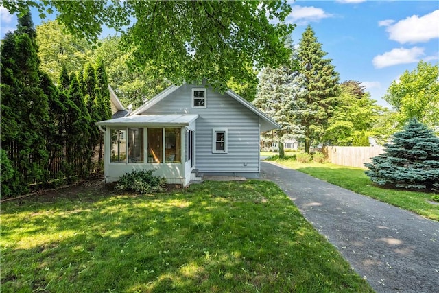 225 Dorking Rd, Brighton, NY 14610 - bungalow-style house with a sunroom