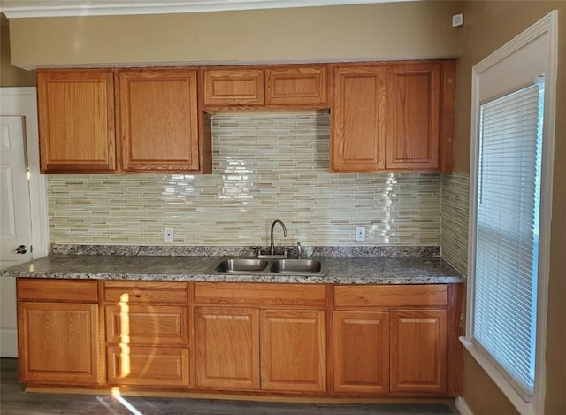 22 Sullivan St, Rochester, NY 14605 - kitchen with backsplash and brown cabinets