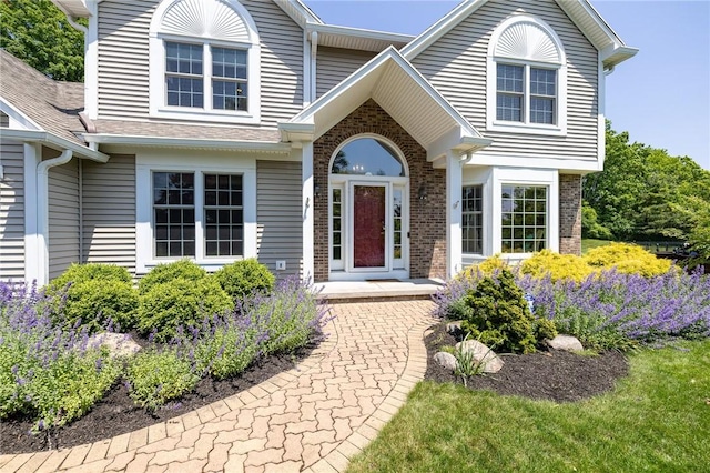 100 Broadmoor Trl, Perinton, NY 14450 - view of front of property with brick siding and roof with shingles