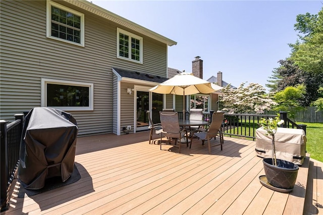 100 Broadmoor Trl, Perinton, NY 14450 - wooden terrace featuring outdoor dining area and area for grilling