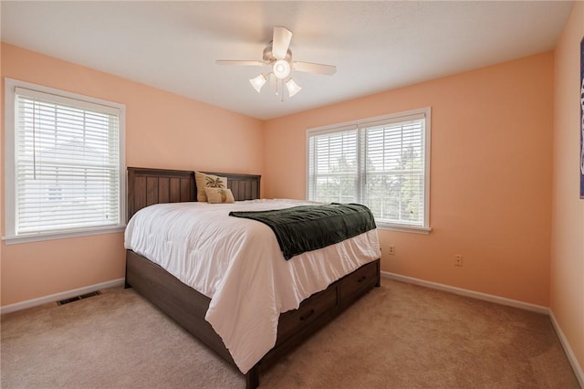 100 Broadmoor Trl, Perinton, NY 14450 - bedroom with light colored carpet and a ceiling fan