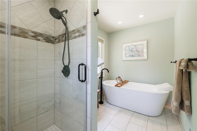 100 Broadmoor Trl, Perinton, NY 14450 - bathroom featuring a shower stall, a soaking tub, tile patterned flooring, and recessed lighting