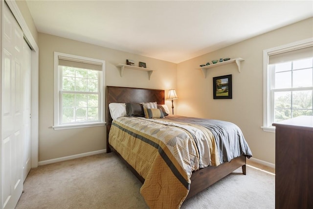 100 Broadmoor Trl, Perinton, NY 14450 - bedroom with light carpet and a closet
