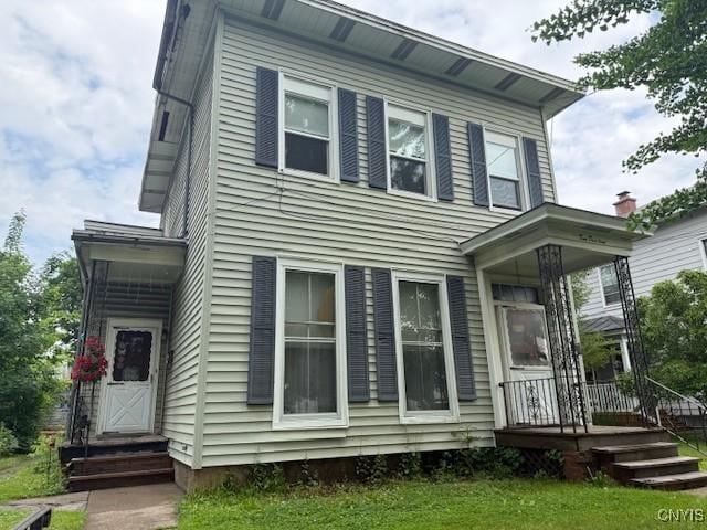 213 N Madison St, Rome-Inside, NY 13440 - view of front of property featuring a front yard and a porch