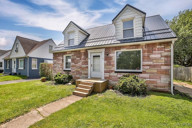 331 S Shore Blvd, Lackawanna, NY 14218 - view of front of property with stone siding and a metal roof