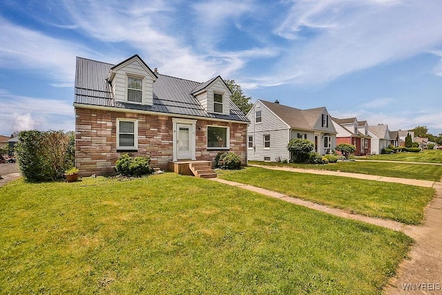 331 S Shore Blvd, Lackawanna, NY 14218 - cape cod home featuring stone siding, a front yard, and a metal roof