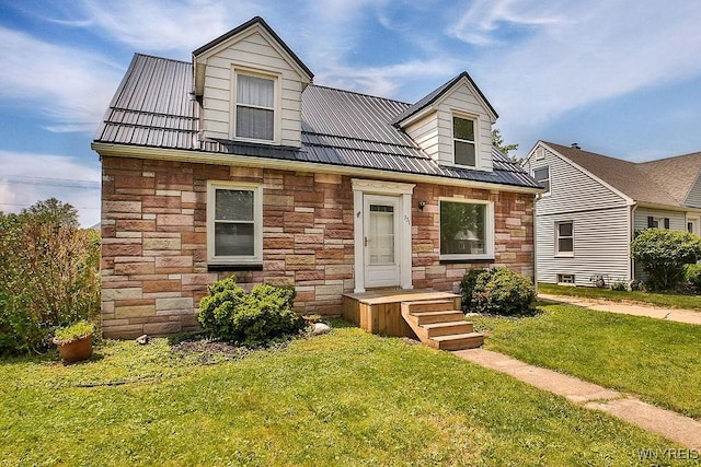 331 S Shore Blvd, Lackawanna, NY 14218 - new england style home with stone siding, a front yard, and a metal roof