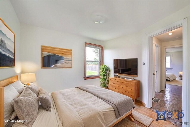 331 S Shore Blvd, Lackawanna, NY 14218 - bedroom featuring wood finished floors and baseboards