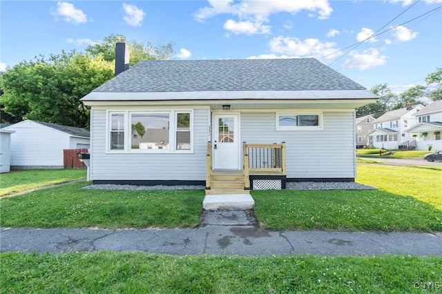 331 Darlington Rd, Syracuse, NY 13208 - bungalow-style home featuring a front yard and roof with shingles