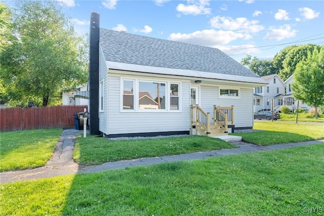 331 Darlington Rd, Syracuse, NY 13208 - rear view of property with roof with shingles