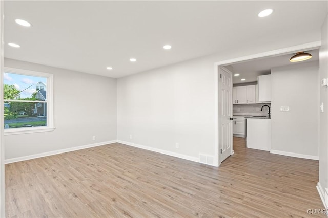 331 Darlington Rd, Syracuse, NY 13208 - unfurnished room with recessed lighting and light wood-type flooring