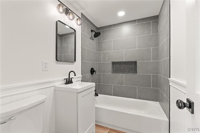 331 Darlington Rd, Syracuse, NY 13208 - bathroom with vanity, tub / shower combination, and a wainscoted wall