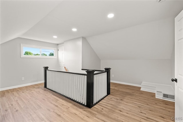 331 Darlington Rd, Syracuse, NY 13208 - additional living space featuring light wood-type flooring, lofted ceiling, and recessed lighting