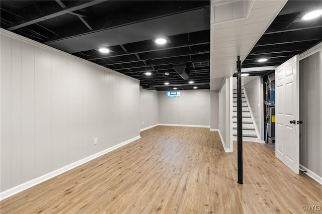 331 Darlington Rd, Syracuse, NY 13208 - below grade area featuring wood finished floors and stairway