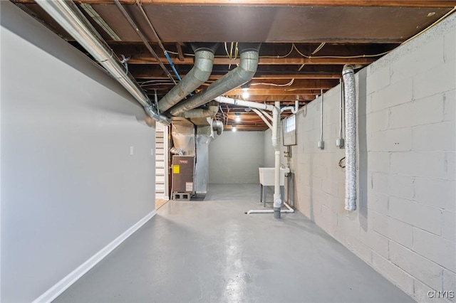 331 Darlington Rd, Syracuse, NY 13208 - unfinished basement featuring heating unit and concrete block wall