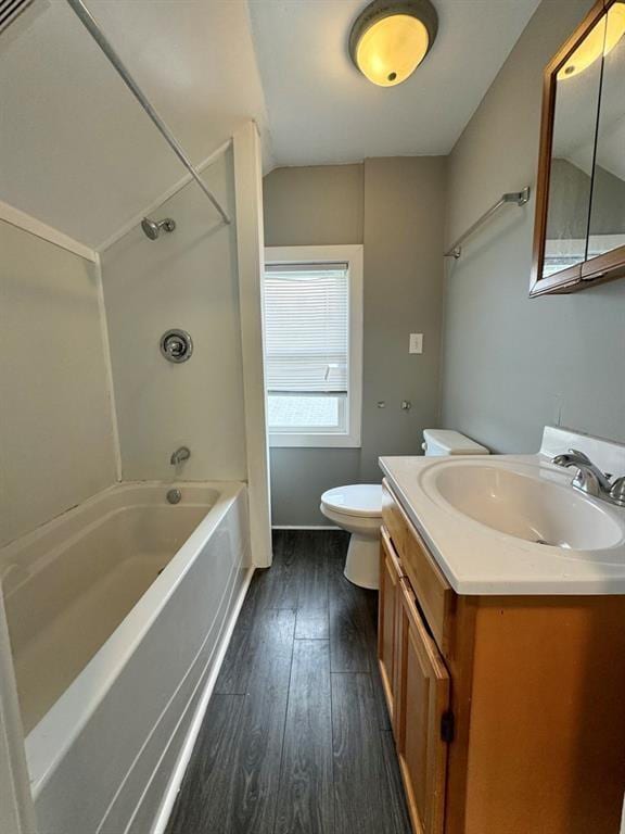 207 Morrow St, Elmira-City, NY 14904 - bathroom featuring wood finished floors, vanity,  shower combination, and vaulted ceiling
