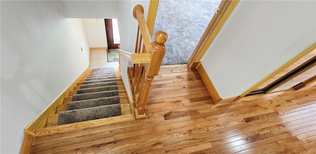 527 Harper Rd, Harpersfield, NY 13786 - staircase with wood finished floors and baseboards