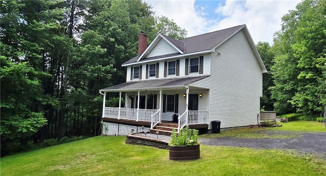 527 Harper Rd, Harpersfield, NY 13786 - view of front of home with covered porch, a chimney, and a front lawn