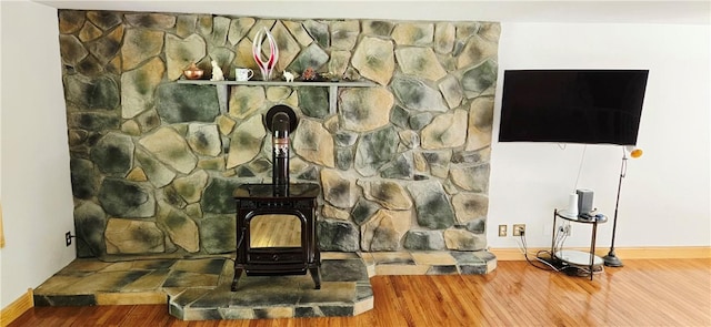 527 Harper Rd, Harpersfield, NY 13786 - detailed view of wood finished floors and a wood stove