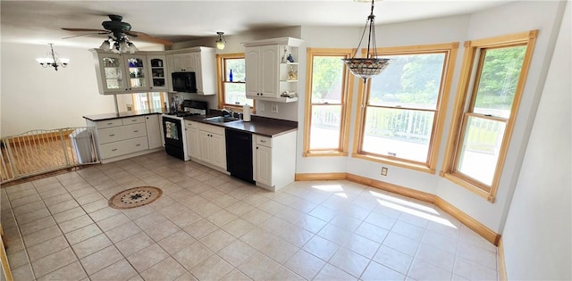 527 Harper Rd, Harpersfield, NY 13786 - kitchen featuring black appliances, a chandelier, dark countertops, and plenty of natural light